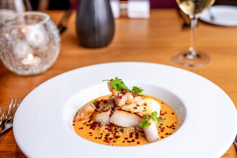 Skrei cod fillet, calamari, red prawn, quinoa, chorizo, prawn bisque with chilli and lime